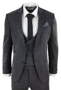 Traje de tres piezas de tweed gris