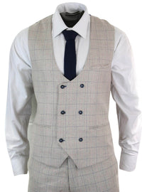 Traje de hombre de 3 piezas color crema con estampado a cuadros azules.