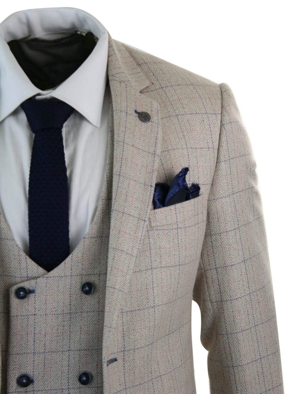 Traje de hombre de 3 piezas color crema con estampado a cuadros azules.