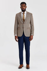 Traje de tweed marrón Harris con pantalón azul marino Mayfair en contraste.