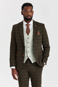 Traje de tweed a cuadros verde Harris con chaleco Belmont color verde salvia en contraste.