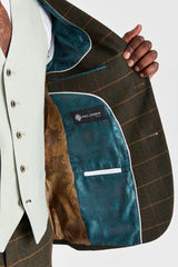 Traje de tweed a cuadros verde Harris con chaleco Belmont color verde salvia en contraste.
