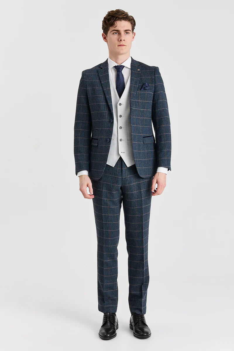 Traje de tweed azul marino Harris con chaleco plateado Belmont en contraste.