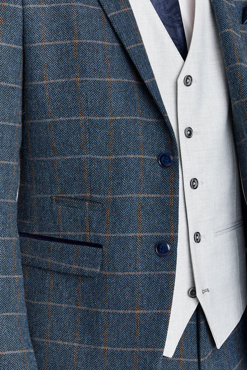 Traje de tweed azul marino Harris con chaleco plateado Belmont en contraste.