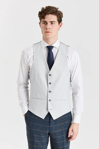 Traje de tweed azul marino Harris con chaleco plateado Belmont en contraste.