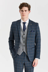 Traje de tweed azul marino de Harris con chaleco de tweed gris de Harris en contraste.