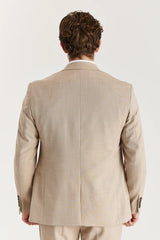 Traje de tres piezas de tweed a cuadros color beige para hombre