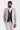 Traje Leo Beige con chaleco Harris de tweed azul marino