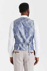 Traje Leo Beige con chaleco Harris de tweed azul marino
