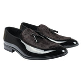 Mocasines negros de charol con borlas para hombre.