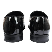 Mocasines negros de charol con borlas para hombre.