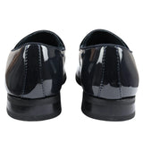 Mocasines de hombre color azul marino con borlas y detalles de charol.