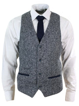Blazer de hombre de corte ajustado, estilo casual elegante, en tweed gris azulado con estampado de espiga.