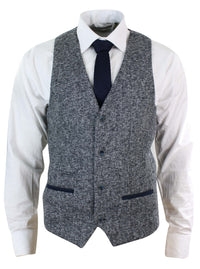 Blazer de hombre de corte ajustado, estilo casual elegante, en tweed gris azulado con estampado de espiga.