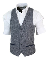 Blazer de hombre de corte ajustado, estilo casual elegante, en tweed gris azulado con estampado de espiga.
