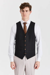 Traje Mayfair Stone texturizado con chaleco negro en contraste.
