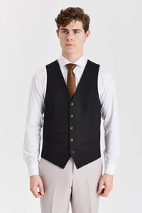 Traje Mayfair Stone texturizado con chaleco negro en contraste.
