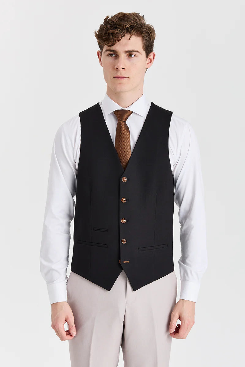 Traje Mayfair Stone texturizado con chaleco negro en contraste.