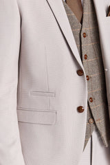 Traje texturizado Mayfair Stone con chaleco de tweed marrón Harris.