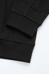 Sudadera negra de hombre con cremallera de un cuarto, mezcla de algodón y cuello alto.