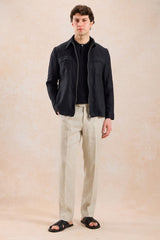 Conjunto de chaqueta de lino negra con cremallera y pantalón beige para hombre, elegante e informal, ideal para el verano.