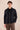Conjunto de chaqueta de lino negra con cremallera y pantalón marrón para hombre, elegante e informal, ideal para el verano.