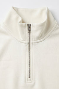 Sudadera de hombre color blanco roto con cremallera de un cuarto, mezcla de algodón y cuello alto.
