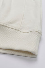 Sudadera de hombre color blanco roto con cremallera de un cuarto, mezcla de algodón y cuello alto.