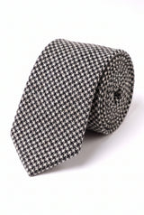 Corbata de lana con estampado de pata de gallo en blanco y negro para hombre.