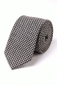 Corbata de lana con estampado de pata de gallo en blanco y negro para hombre.