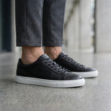 Zapatillas deportivas casuales de cuero negro con cordones para hombre
