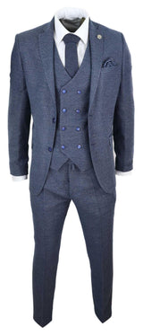 Traje azul de tres piezas para hombre con chaleco cruzado.