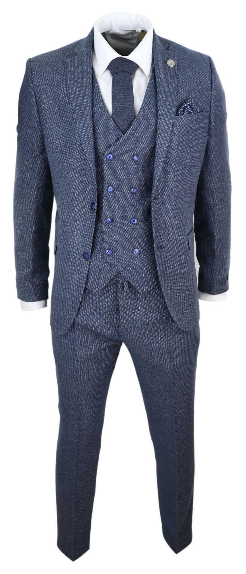 Traje azul de tres piezas para hombre con chaleco cruzado.