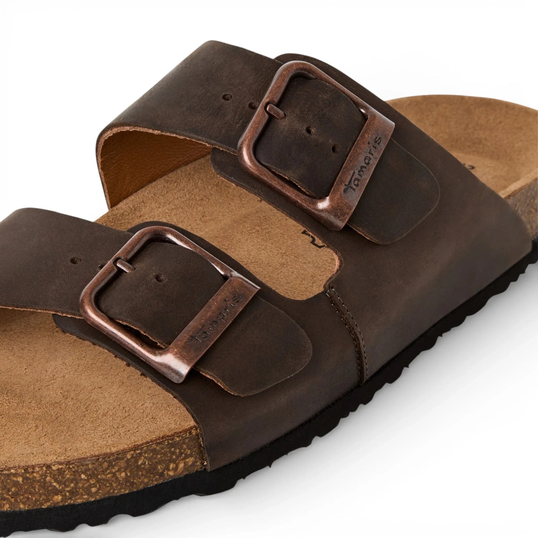 Sandalias tipo pantufla de cuero marrón para hombre con plantilla ajustable.
