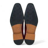 Zapatos de hombre de cuero burdeos, estilo clásico formal, con cordones y diseño brogue.