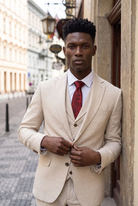 Corbata de hombre color burdeos con estampado paisley.