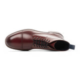 Botines Balmoral de piel burdeos para hombre con puntera reforzada.