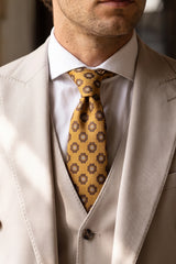Corbata dorada con estampado paisley para hombre