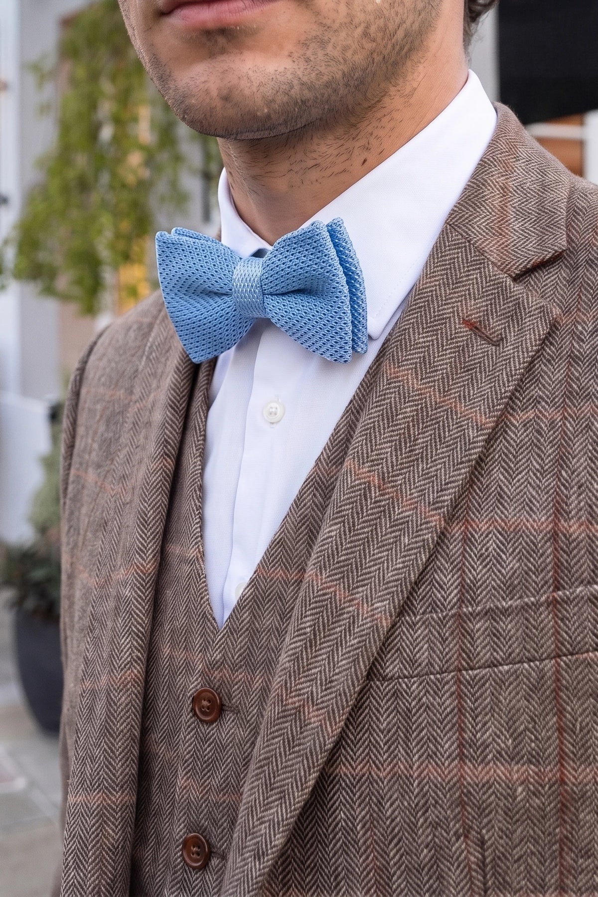Pajarita de punto azul claro para hombre