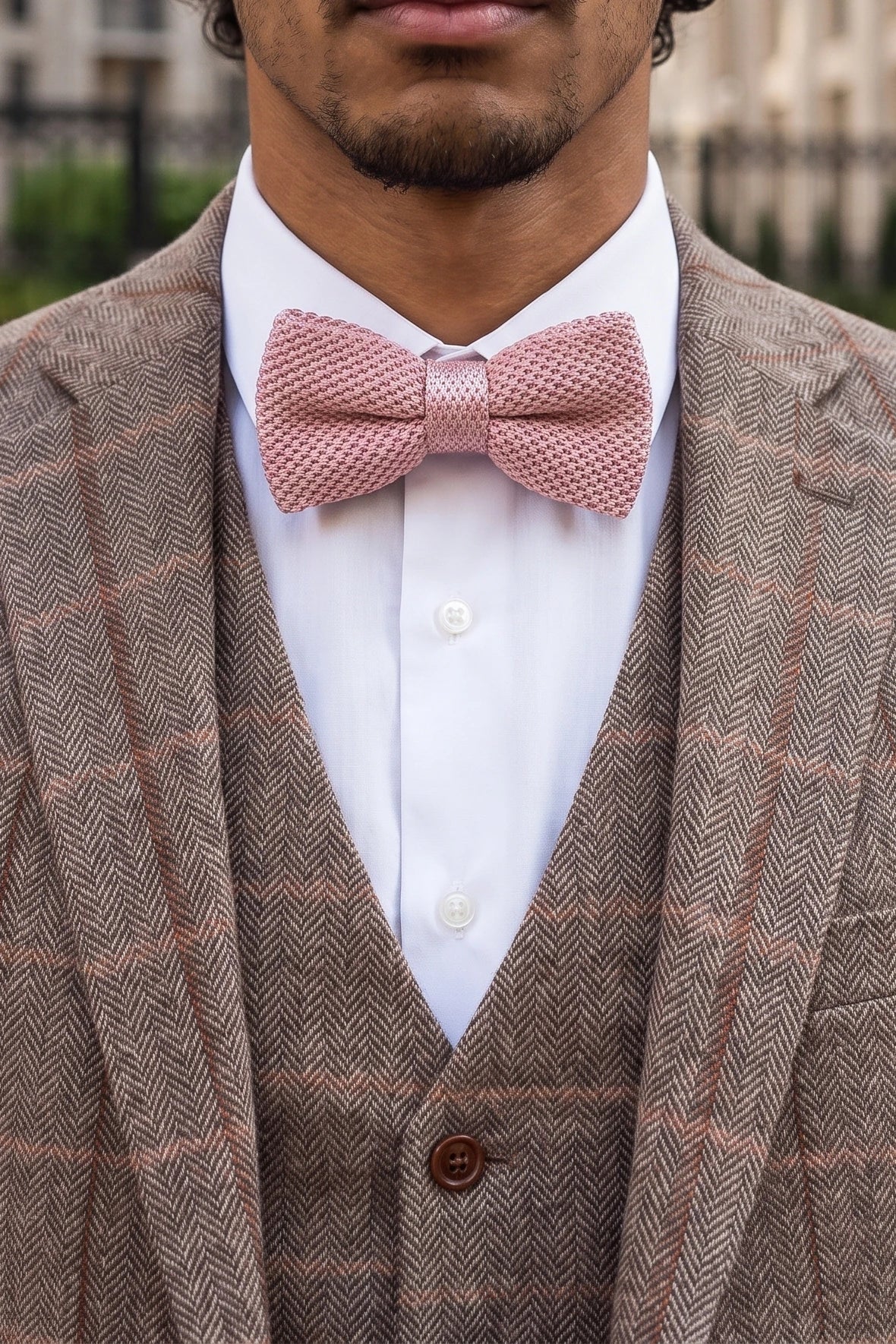 Pajarita de punto rosa para hombre