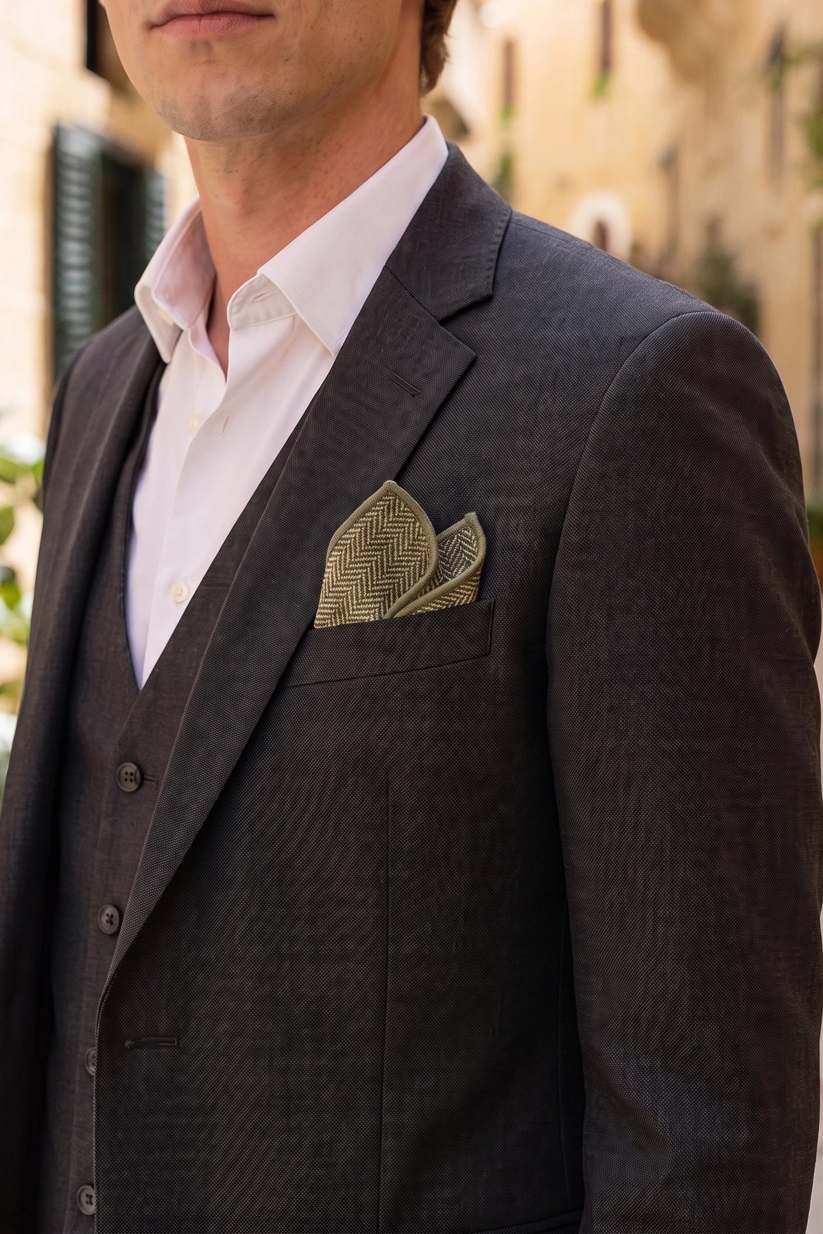 Pañuelo de bolsillo para hombre de mezcla de lana y tweed verde salvia.