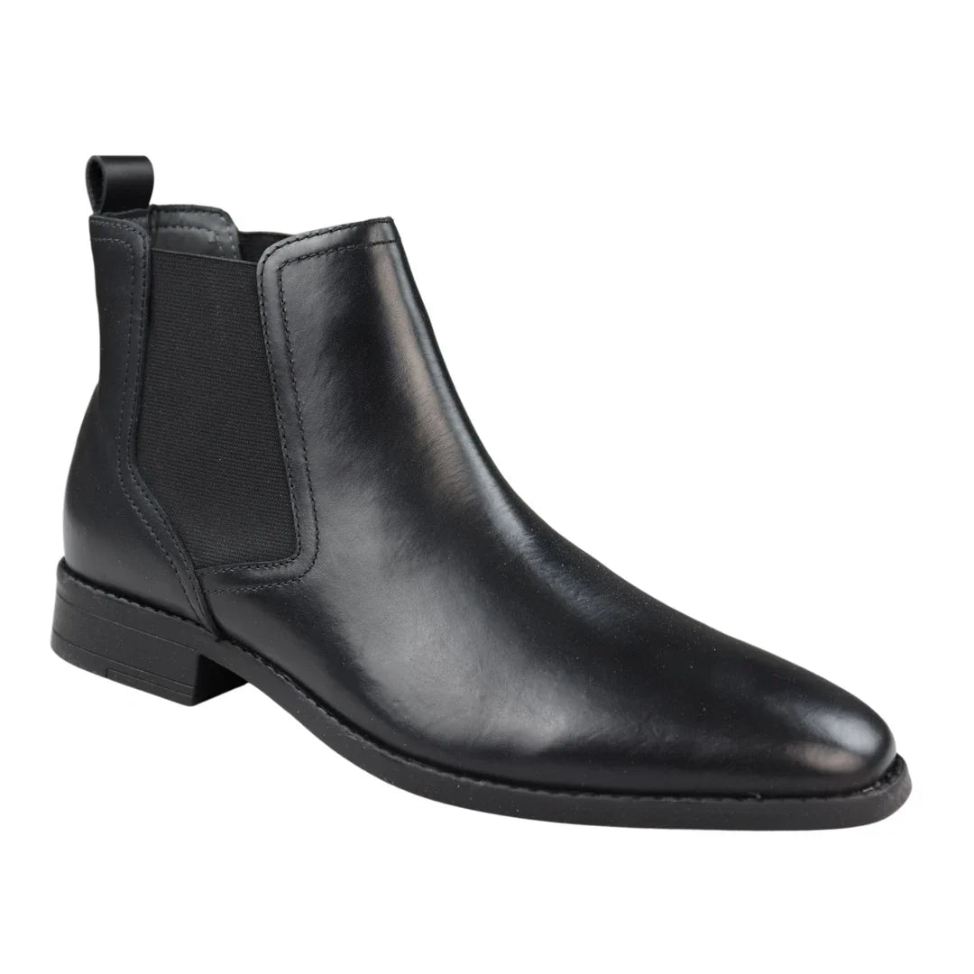 Botas Chelsea negras sin cordones para hombre, de piel auténtica, estilo casual elegante.