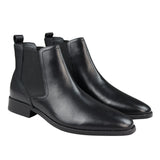 Botas Chelsea negras sin cordones para hombre, de piel auténtica, estilo casual elegante.