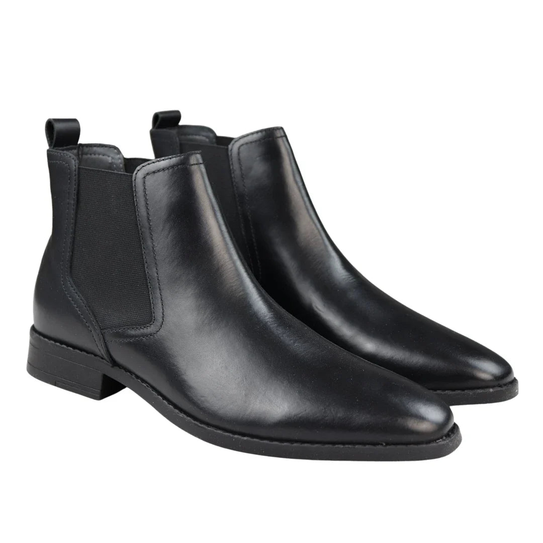 Botas Chelsea negras sin cordones para hombre, de piel auténtica, estilo casual elegante.