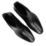 Botas Chelsea negras sin cordones para hombre, de piel auténtica, estilo casual elegante.