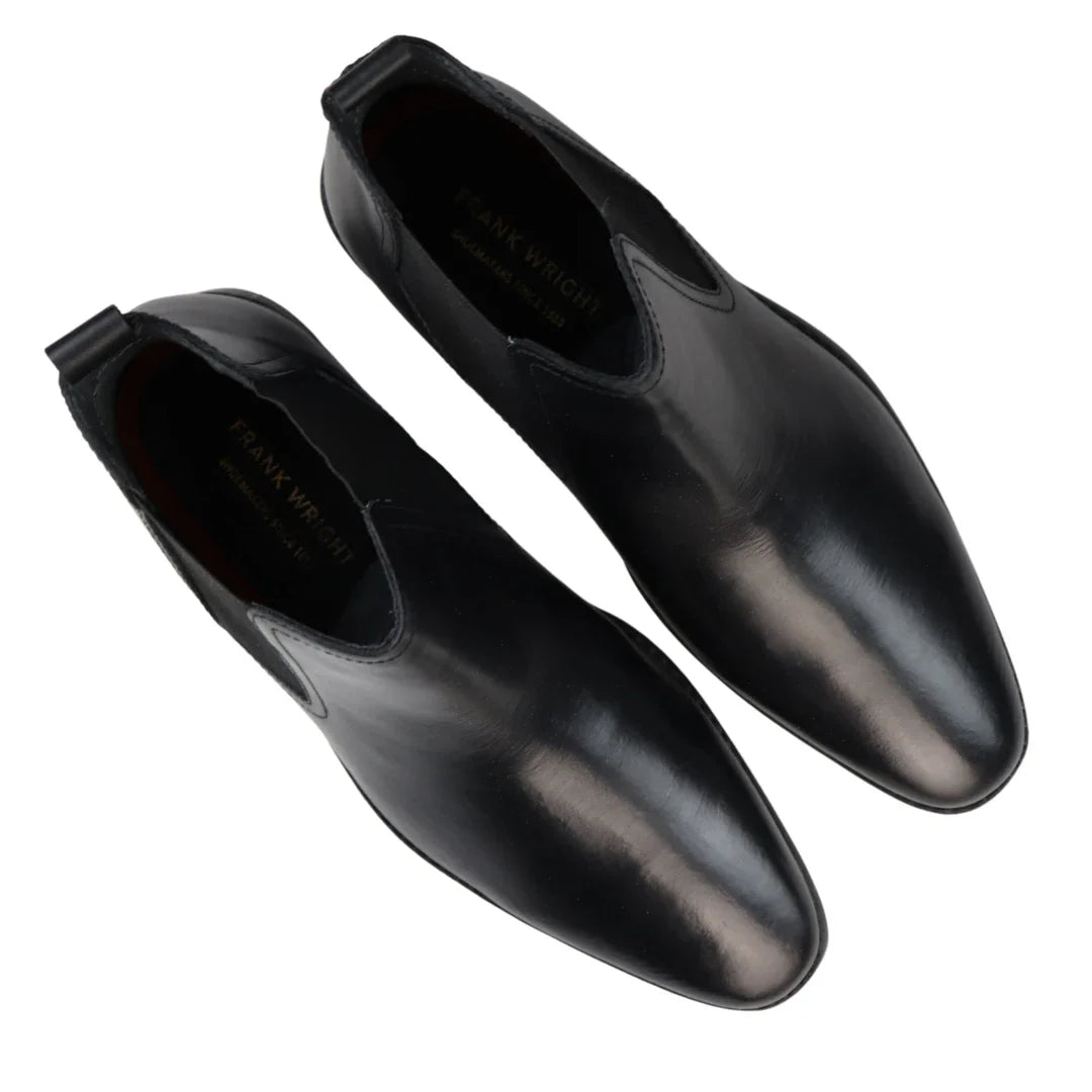 Botas Chelsea negras sin cordones para hombre, de piel auténtica, estilo casual elegante.