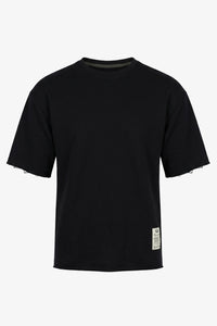 Camiseta de hombre azul marino oscuro de corte relajado con borde sin rematar, mezcla de algodón y cuello redondo.