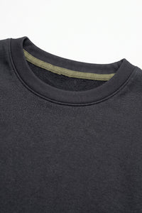 Camiseta de hombre azul marino oscuro de corte relajado con borde sin rematar, mezcla de algodón y cuello redondo.
