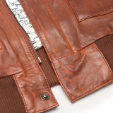 Chaqueta bomber de aviador para hombre con cuello de piel negro extraíble.