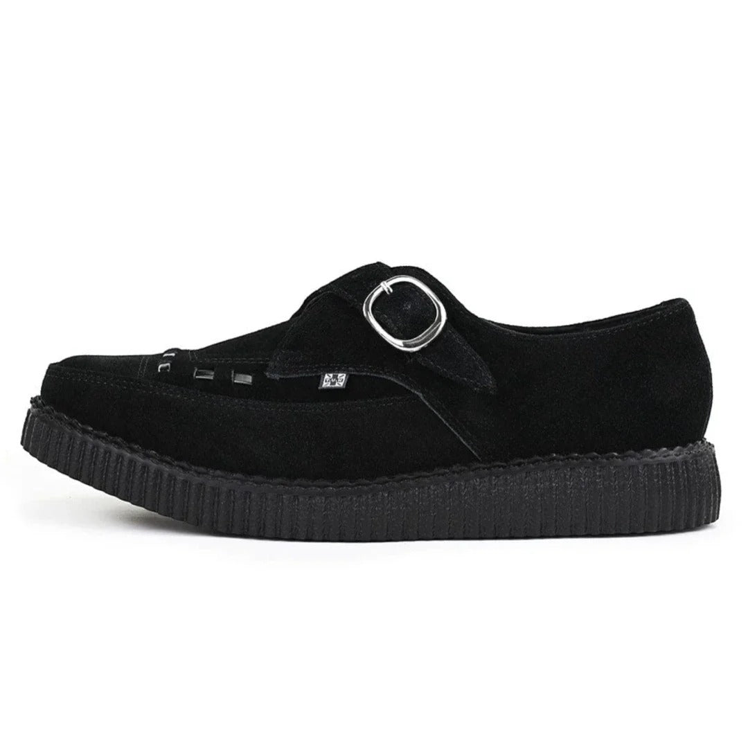 Zapatos de plataforma con hebilla Monk y punta puntiaguda estilo creeper en ante negro.